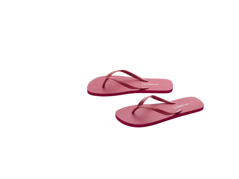 A pair of pink flip-flops with a textured sole on a black background.