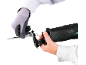 Gloved hands insert a saw blade into a reciprocating saw.
