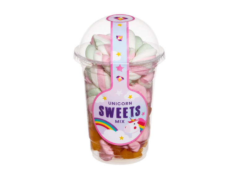 Unicorn sweets mix: clear cup with white, pink, and green marshmallows and fruit jelly.