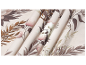 Fabric with a pastel floral pattern, featuring roses and leaves.