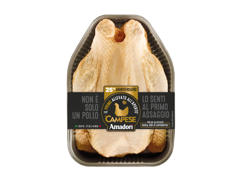 Raw chicken in packaging, with a '25th anniversary' label and information about antibiotic-free farming.