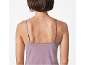 Woman in a mauve spaghetti strap top, back view.