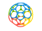Colorful, perforated baby play ball in blue, green, red, and yellow.
