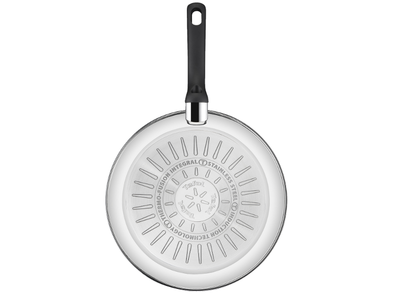 Bottom of a frying pan with a black handle, showing induction technology.
