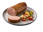 Cooked sausage with grilled zucchini and white beans in tomato sauce on a plate.
