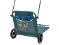 Beach trolley with mesh pocket holding sand toys, including shovels and molds.