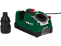 Green drill and tool sharpener with a black attachment
