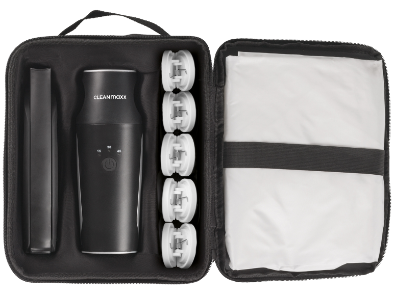 Garment cleaning kit with main device, refills, and wash bag