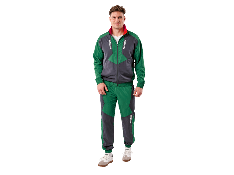 Man in green and grey tracksuit with 'PARKSIDE' lettering and white sneakers.