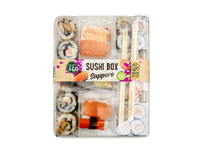 Sushi box with maki, salmon and shrimp nigiri, chopsticks, and sauce.