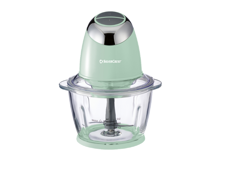 Mint green chopper with a glass bowl and measuring scale.