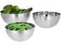 Stainless steel bowls with lettuce and snap peas.
