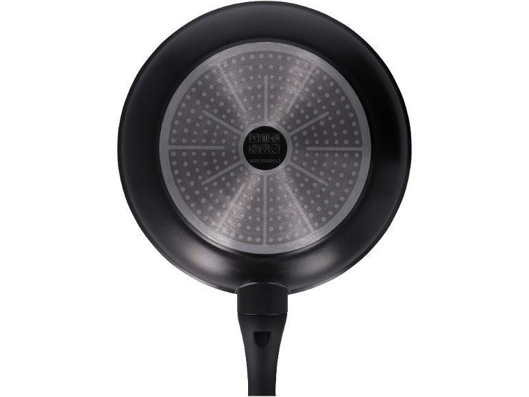 Bottom of a frying pan with an induction base and compatibility symbols.