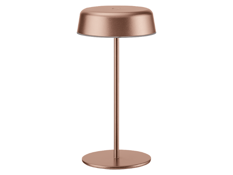 Copper-colored table lamp with a round base and shade