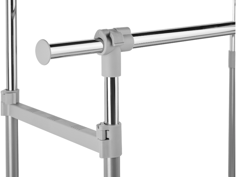 Detail of a chrome clothes rail with grey plastic connectors