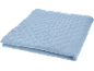Folded light blue blanket or duvet with a quilted scale pattern.