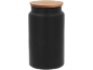 Black kitchen canister with a wooden lid