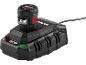 Black battery and charger with a green charging indicator