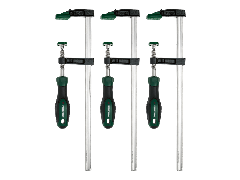Three bar clamps with green handles and black jaws on a black background.