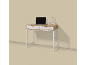 Wooden desk with white drawers, a laptop, and a bottle and glass of water.