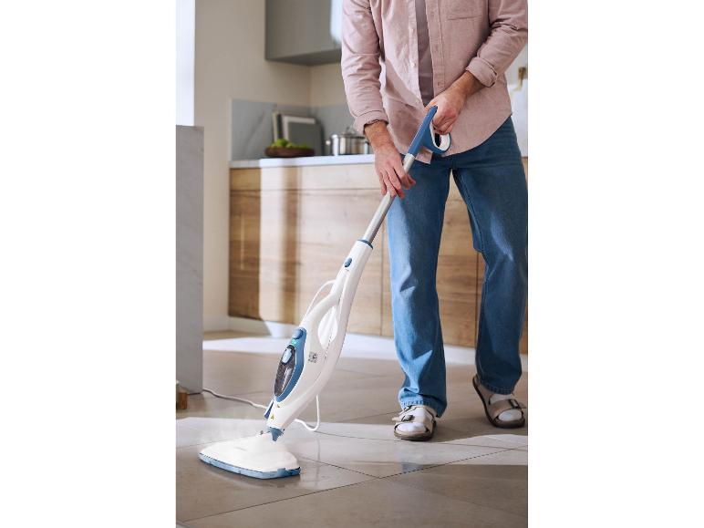 Person cleaning floor with a steam cleaner in a kitchen.