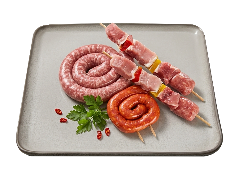 Meat skewers and spiral sausages with parsley and chilies on a plate.