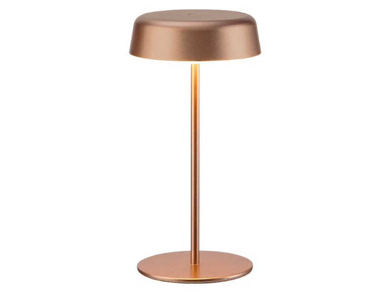 Copper table lamp with a round base and glowing lampshade.