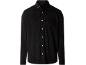 Black corduroy shirt with white buttons and a chest pocket.