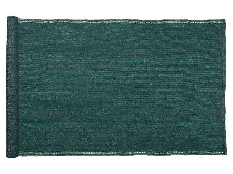 Green privacy screen or windbreak fabric, rolled on one side.