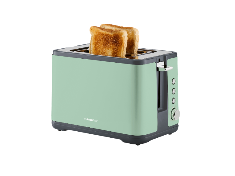 Mint green toaster with two slices of toasted bread.