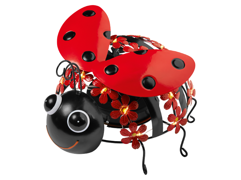 Metal ladybug garden decoration with red flowers and LED lights.