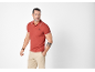 Men's red short-sleeved polo shirt and beige trousers.