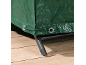Close-up of a green tarpaulin cover with grommets and a drawstring, protecting furniture on a wooden deck.