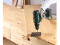 Cordless drill fixing a hinge to a wooden board.