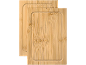 Two bamboo cutting boards with juice grooves