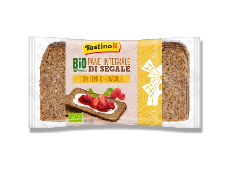 Packaging of rye bread with sunflower seeds, with berries and yogurt on a slice