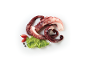 Cooked octopus with lettuce, tomato, and black peppercorns on a white background.