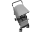 Grey baby stroller with a canopy and safety harness.