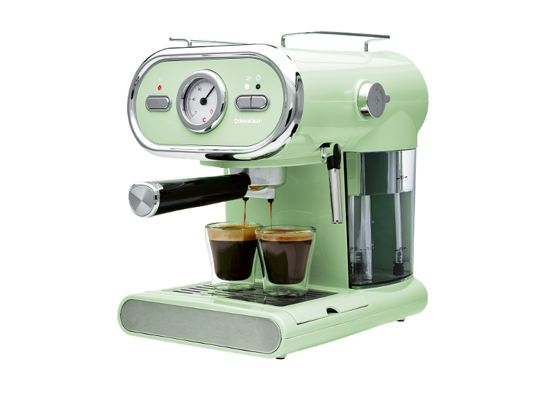 Light green retro espresso machine brewing two cups of coffee.