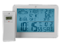 Digital weather station with outdoor sensor displaying temperature, humidity, pressure, time, and date.