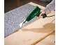 A person uses a heat gun to work on flooring.
