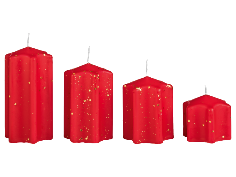 Four red candles with gold star glitter, in varying sizes.
