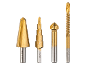 Four gold-colored step drills and countersink bits of various sizes on a black background.