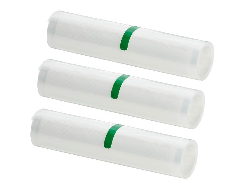 Three rolls of vacuum sealer film with a green stripe