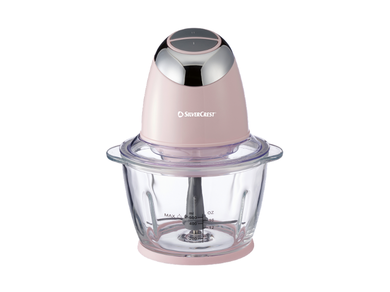Pink chopper with a transparent glass bowl and measuring scale.