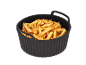 Crispy french fries in a black bowl, ready to enjoy.