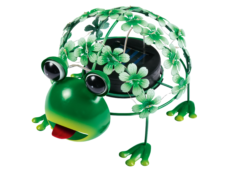 Green metal solar lamp in the shape of a frog with clovers.