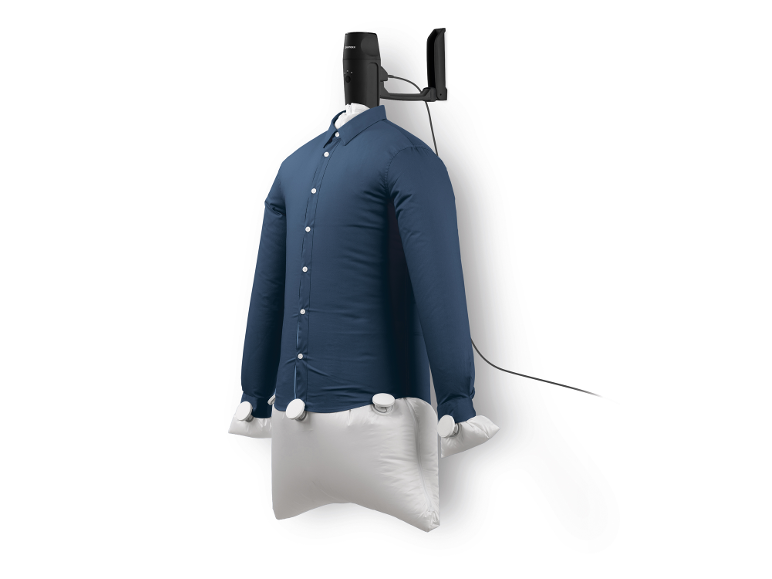 Wall-mounted automatic shirt dryer and ironer with a blue shirt