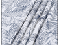 White fabric with blue tropical leaf and flower print, draped.