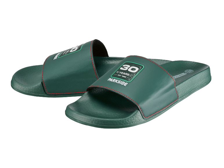 Green slides with red stitching and the inscription “30 YEARS EST 1996 PARKSIDE”.
